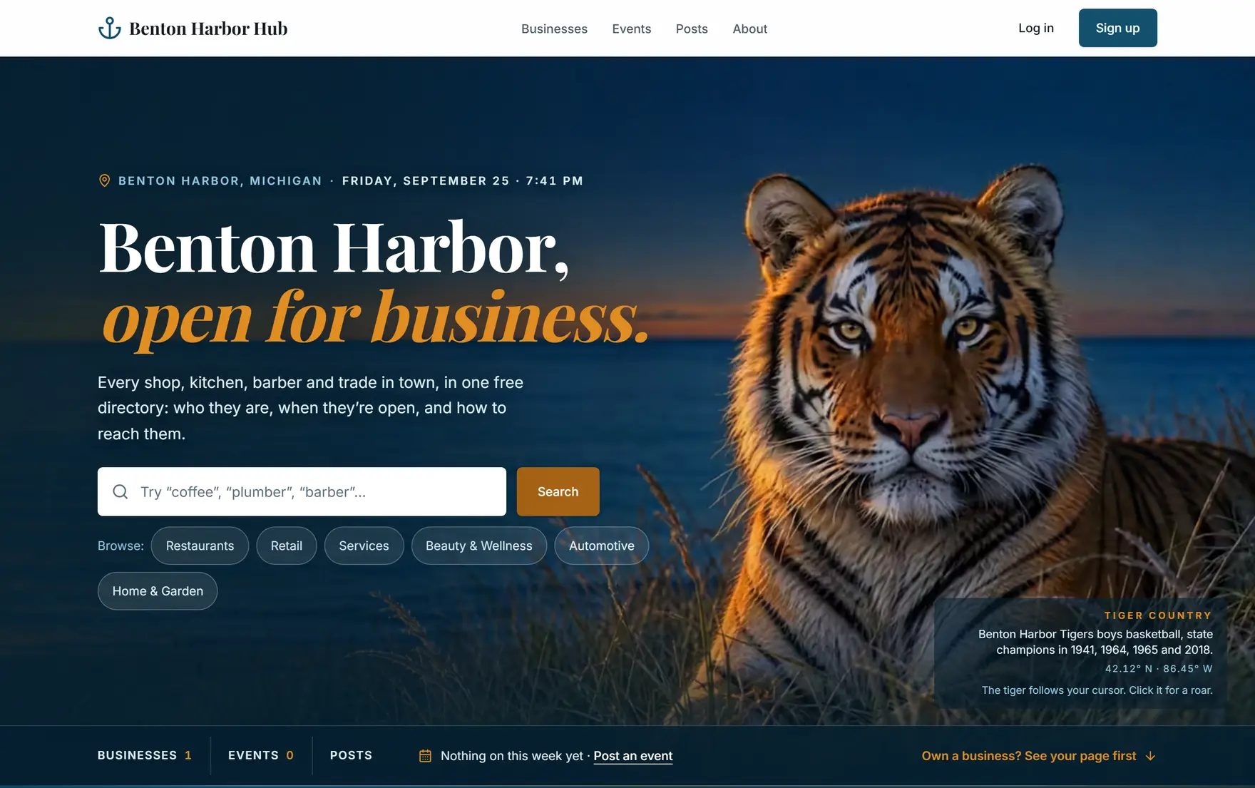 The directory's first screen: the tiger by the lake, the search box and the category chips.